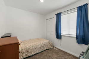 View of carpeted bedroom