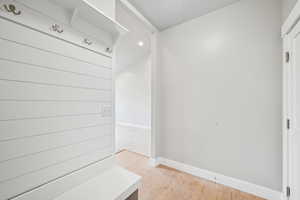 Mudroom featuring hardwood / wood-style flooring