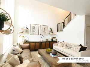 Living room featuring a towering ceiling