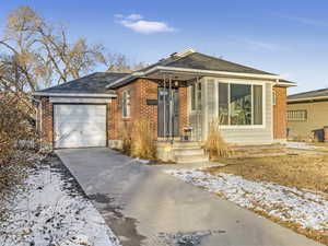 Single story home with a garage