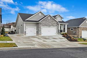 Craftsman-style house featuring a garage