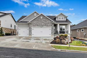 Craftsman-style home with a garage