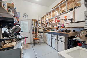 Kitchen featuring white cabinets