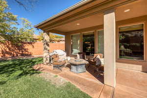 View of patio / terrace with a fire pit