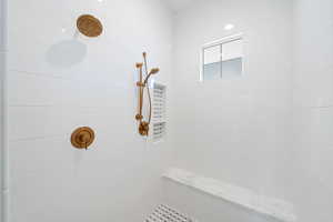 Bathroom with a tile shower