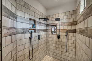 Bathroom with a tile shower