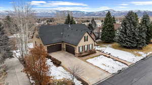 Snowy aerial view with a mountain view