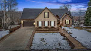 View of front of property with a garage