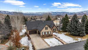 Snowy aerial view with a mountain view