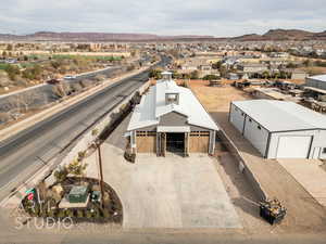 Birds eye view of property featuring a mountain view