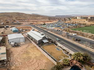 Birds eye view of property featuring a mountain view