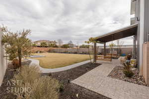 View of yard with a patio