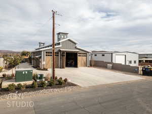 View of front of property featuring a garage