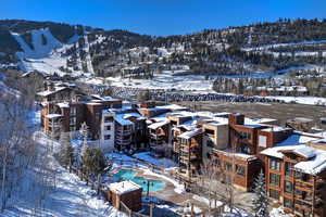 Snowy aerial view with a mountain view