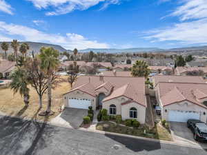 Birds eye view of property featuring a mountain view