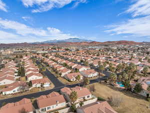 Birds eye view of property featuring a mountain view