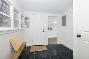 Open laundry room concept with beautiful new slate flooring