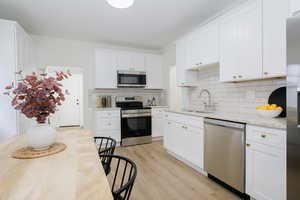 All new kitchen cabinetry with custom pantry