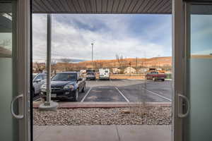 View of vehicle parking featuring a mountain view