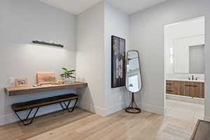 Interior space featuring sink and light hardwood / wood-style floors