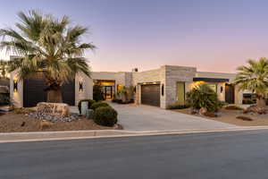 View of front of house with a garage