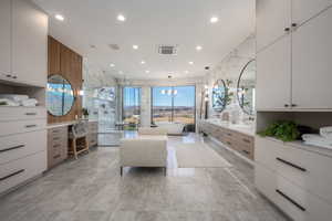 Bathroom with vanity and independent shower and bath