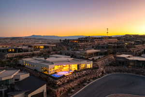 Aerial view at dusk featuring a mountain view