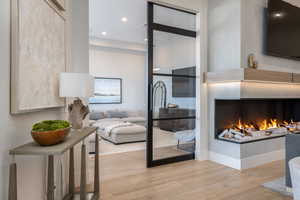 Living room with light wood-type flooring