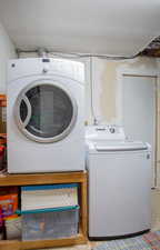 Laundry room with washing machine and dryer