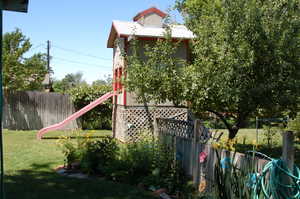 View of yard featuring a playground