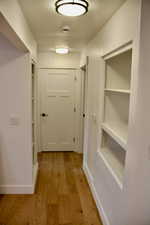 Hallway featuring light hardwood / wood-style floors