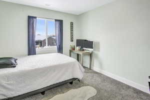 Bedroom featuring carpet floors