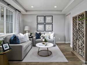 Living room with dark hardwood / wood-style floors