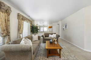 Living room with light colored carpet