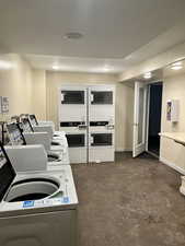 Washroom with independent washer and dryer and stacked washer and clothes dryer