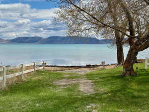 View of water feature featuring a mountain view.  Lake access.