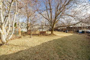 View of yard with an outdoor structure