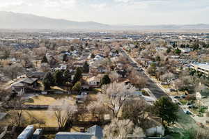 Birds eye view of property with a mountain view