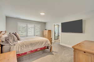 View of carpeted bedroom