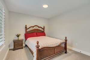 View of carpeted bedroom