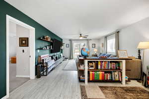 Interior space featuring ceiling fan and hardwood / wood-style floors