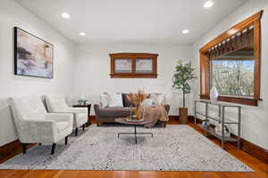 Living room with light wood-type flooring