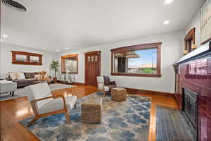 Living room featuring dark hardwood / wood-style floors