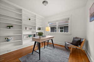 Office area featuring wood-type flooring