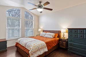 Living room featuring light colored carpet, a textured ceiling, and ceiling fan