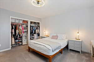 Bedroom featuring a closet and carpet