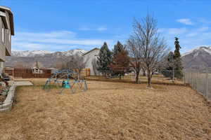 View of yard with a mountain view