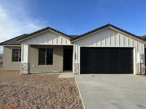 View of front of home featuring a garage