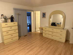 Bedroom featuring light wood-type flooring