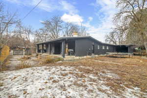 View of side of property featuring a trampoline